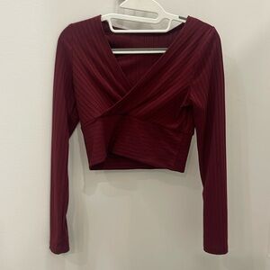 Red cross over long sleeve top